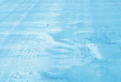 BACHE A BULLES PISCINE BOIS LOUISIANA 400µ BLEU BORDEE 4 COTES